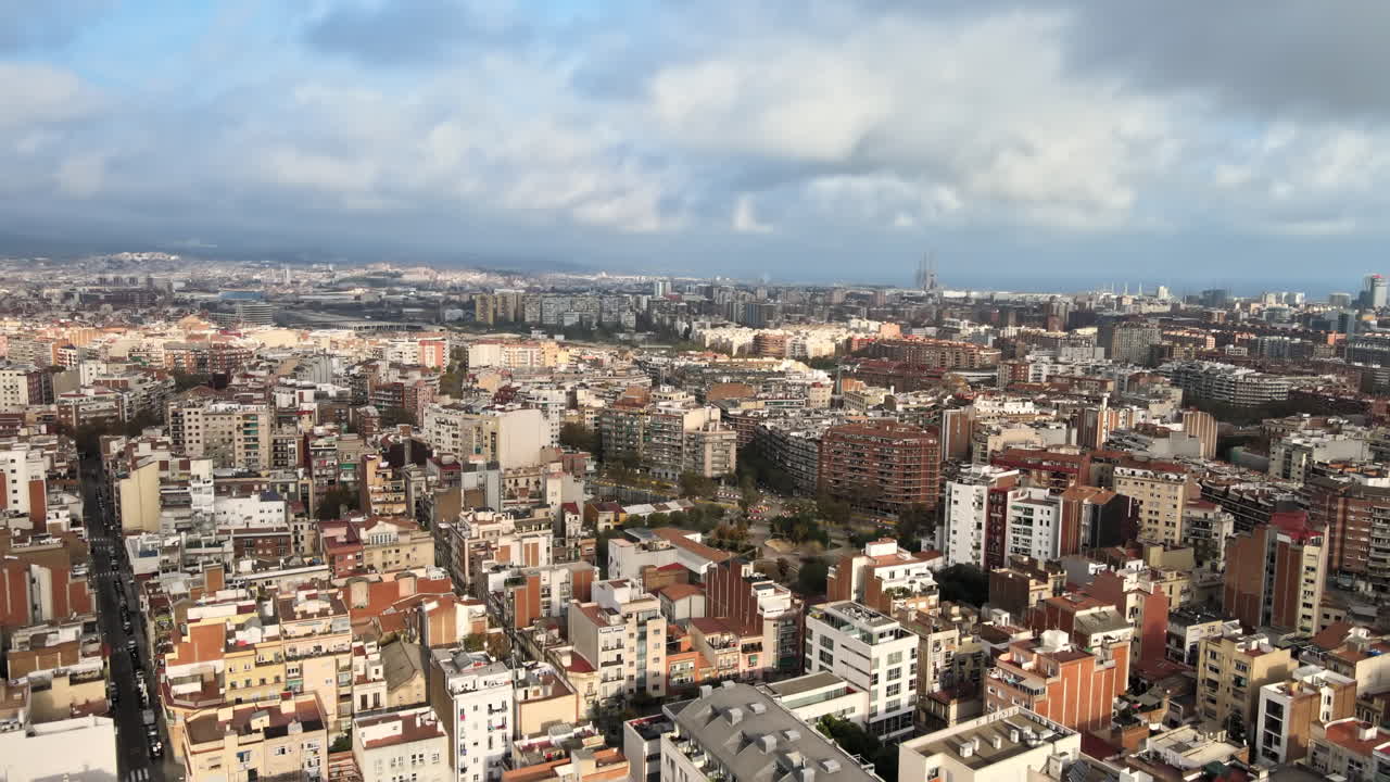 Aerial drone view of Barcelona, Spain. Blocks with multiple residential buildings, streets