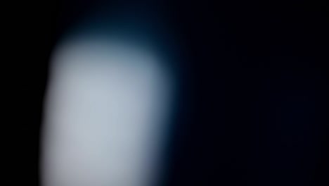 abstract glass light leaks reflections on black background