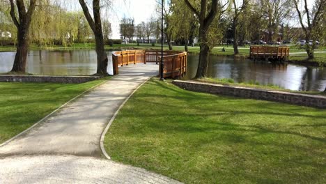 aerial of catwalk on pond in urban park