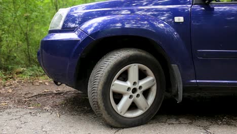 man get in a car and start movement from off road spot, aggressive start of suv