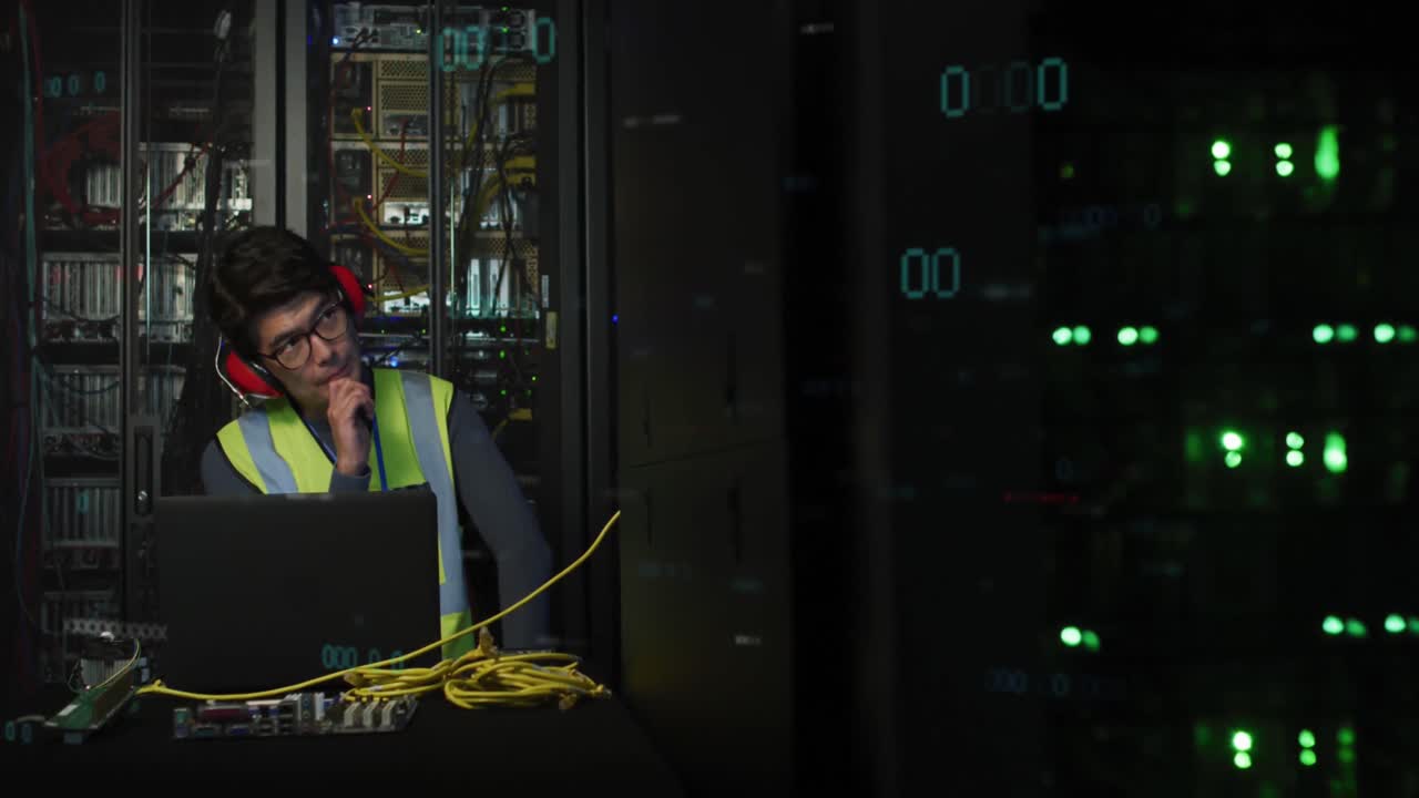 Animation of data processing over asian male it engineer and computer servers