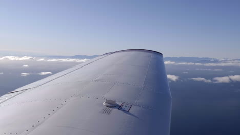 Traveling-in-the-clear-blue-sky-on-a-sunny-day--wide