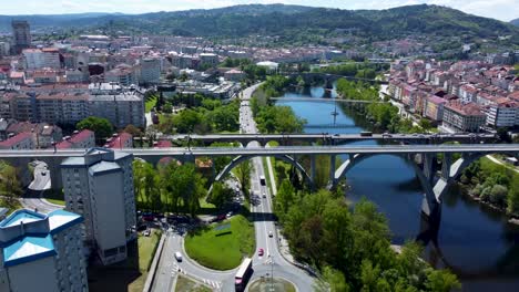 Aerial-view-of-Miño-river-as-it-passes-through-Ourense,-Spain