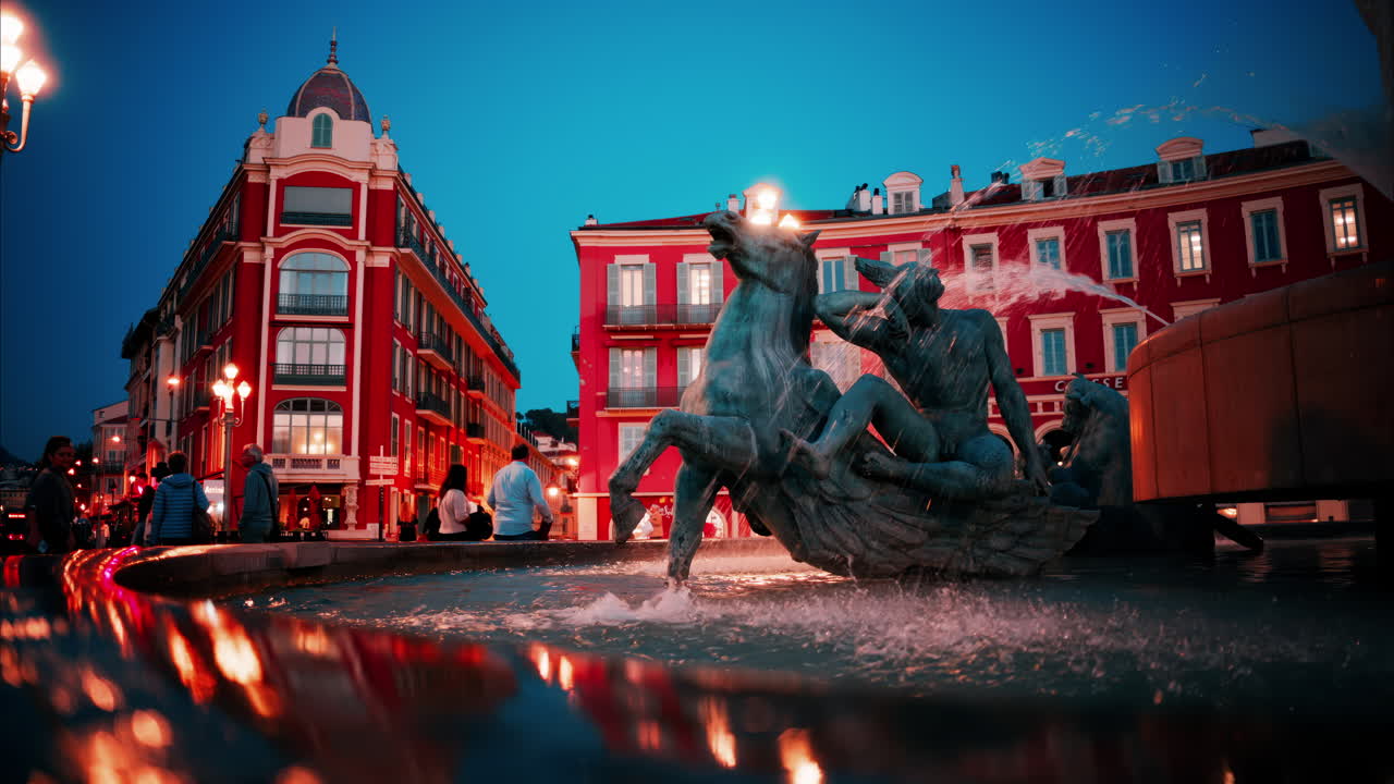 Nice, France - October 8, 2024: Close up of the Fontaine du Soleil at Place Massena in the evening