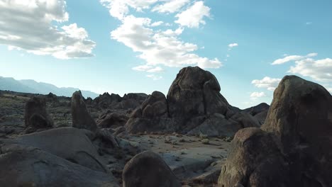 cinematic drone aerial view on sandstone rock formations in arid american desert landscape