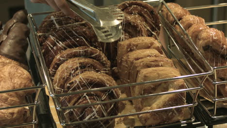 steady shot of different pastries in a buffet basket