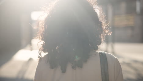woman walking away