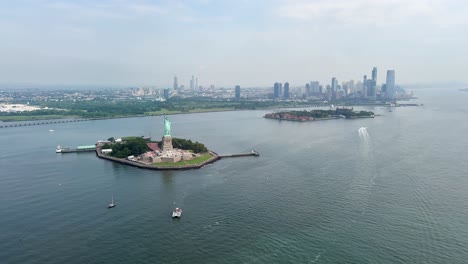 aerial view of the statue of liberty and new york city skyline