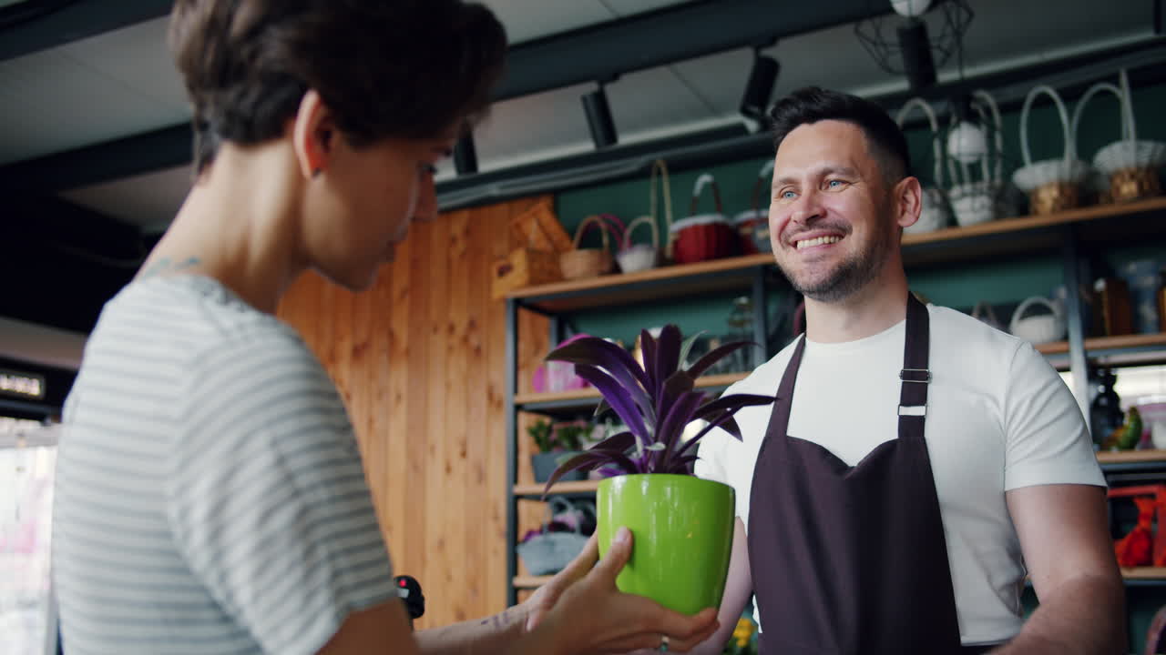 Customer interacting with a florist in a shop