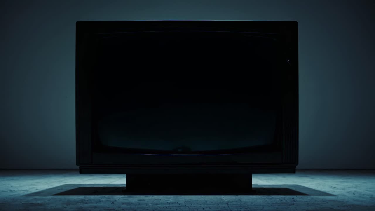 A retro TV displaying colorful static from a low-angle view, evoking nostalgia and chaos