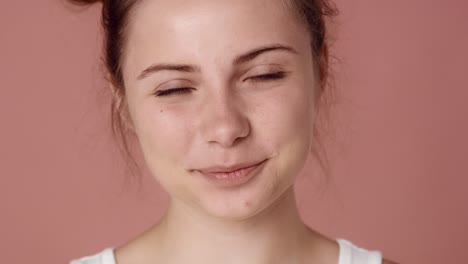 close up portrait of fully smiling caucasian teenage woman.