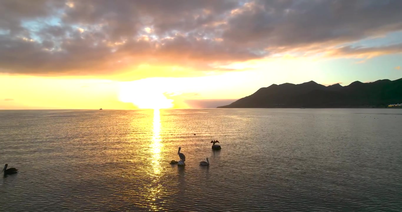​Sunset drone shot of beautiful Magdalena Bay Mexico with mountains and birds