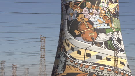 vibrant mural on johannesburg cooling towers: a celebration of music and culture