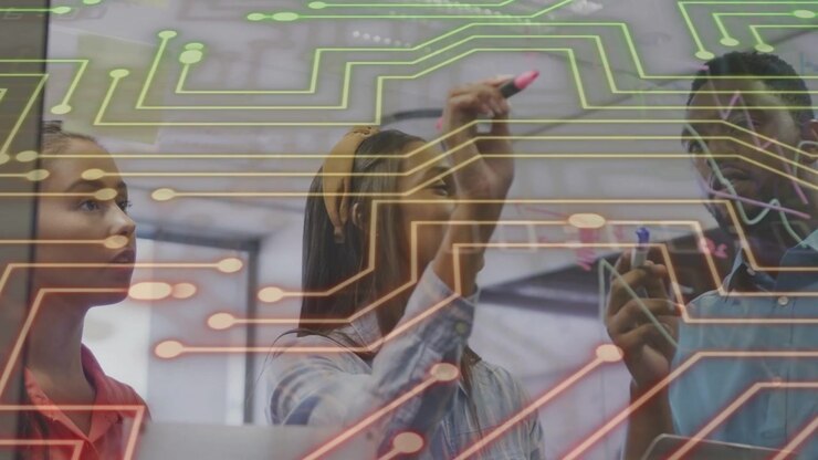 Lead woman marking glass with pink marker team pointing tablet circuit overlay for tech planning