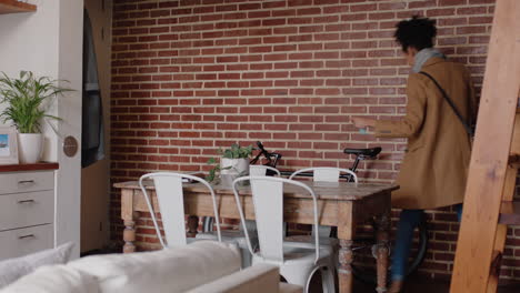 beautiful young woman getting ready leaving apartment with bicycle late for work