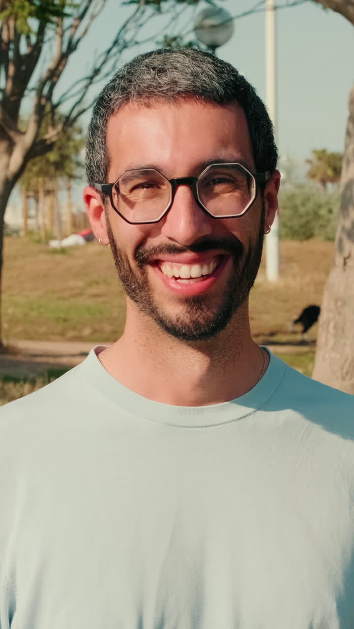 Happy Man Smiling at Picnic in the Park