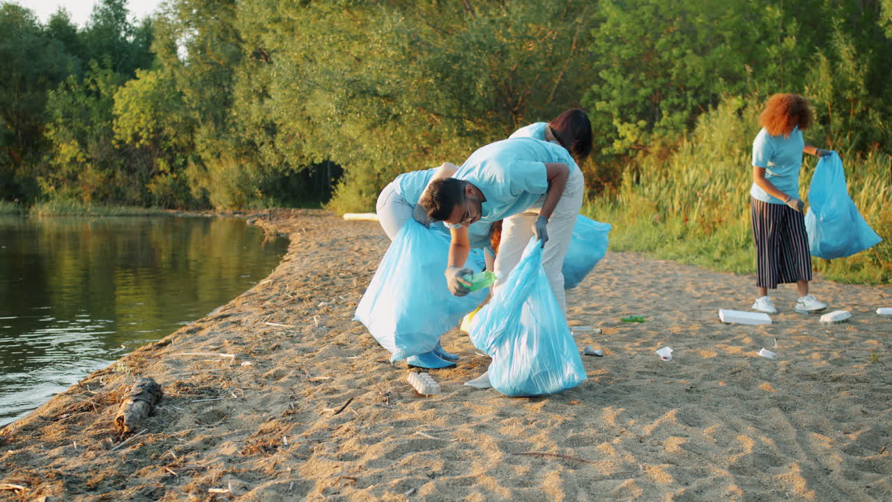 Community Volunteers Cleaning Up a Beach