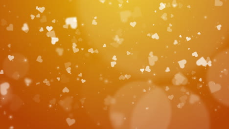 falling hearts on yellow animated love background with bright glow and bokeh. copy space. anniversary, valentine's day. looped motion graphics.