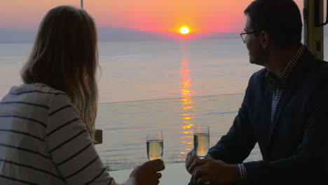 couple on romantic date at seaside cafe