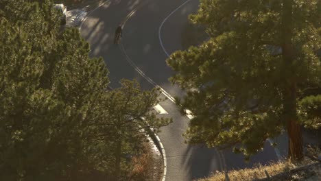 aerial view of biker riding in the mountains