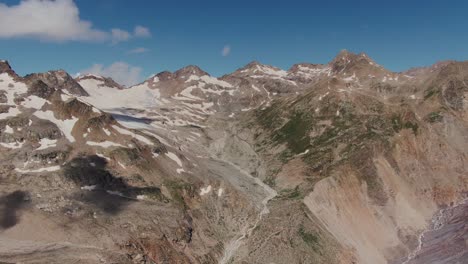 aerial view of majestic mountain range with glaciers