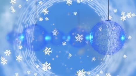Digital-animation-of-snowflakes-falling-over-multiple-baubles-hanging-against-blue-background