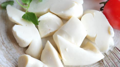 closeup of a plate of fresh mozzarella cheese