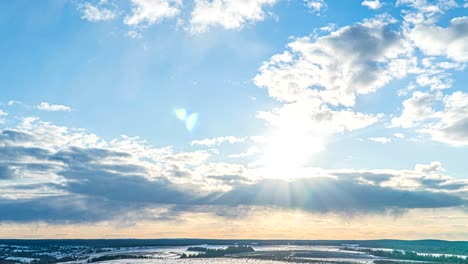 simultaneous movement of clouds of different levels, time intervals, beautiful pre-sunset landscape loop video