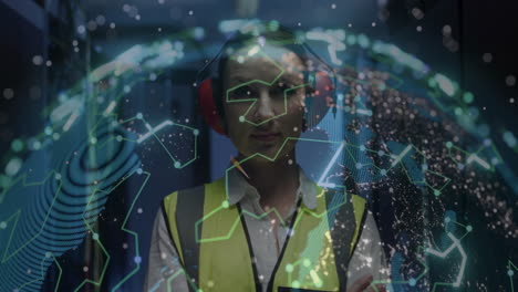 wearing safety gear, industrial worker in factory with digital network animation