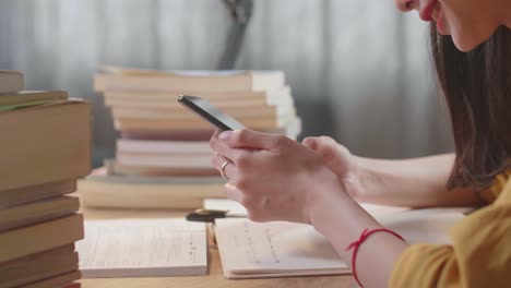 woman studying with smartphone