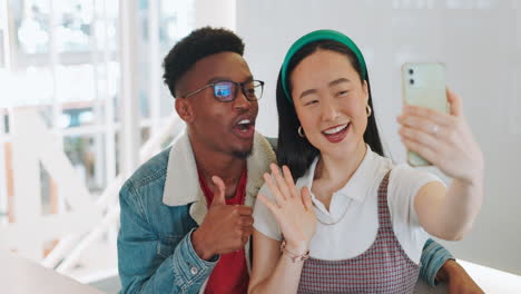 phone selfie, peace sign and thumbs up of couple
