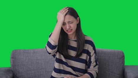 upset indian girl slapping her head green screen