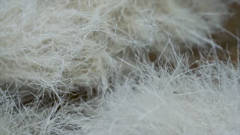 closeup of synthetic fibers in a clothing sweatshop