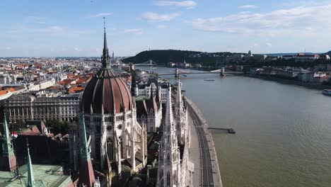 Tight-truck-shot-of-the-Parliament-of-Hungary-and-the-Danube-river-in-Budapest