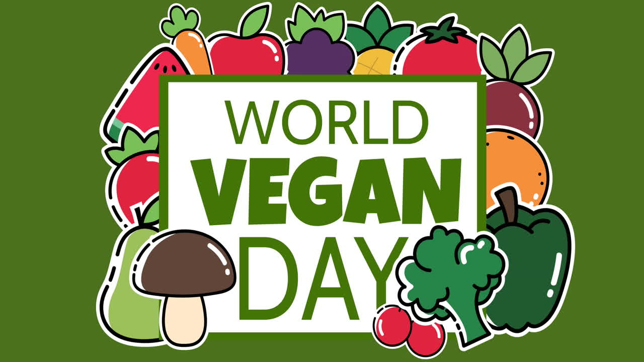Animatie van tekst 'Wereld Vegan Dag' over fruit en groenten op groene achtergrond