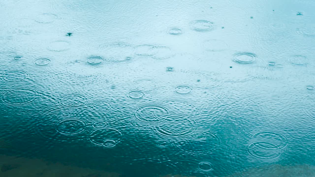 Abstract background, rain drops on the water