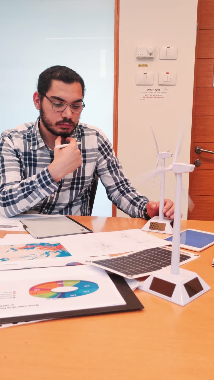 Professional Man Explaining a Concept in a Business Meeting