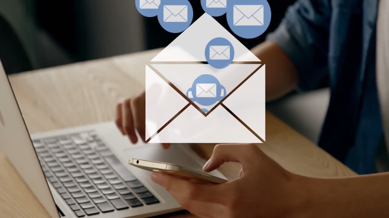 Person texting on a phone with a laptop 4k