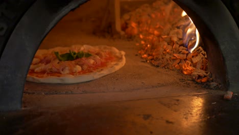 Pizza-baking-in-wooden-oven-part-1-from-3-4K