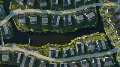 roompot water village with man-made stream and stylish eco-friendly houses in kamperland, zeeland, netherlands