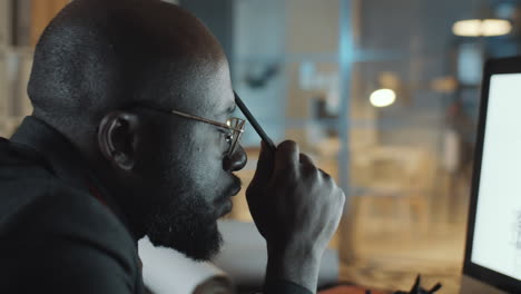 african american engineer working late in office