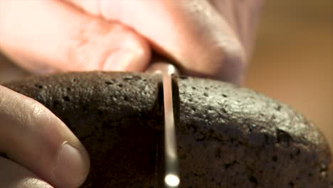 cutting a chocolate cake