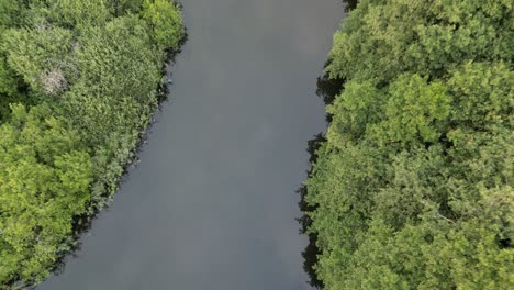 Drone-recording-of-Gudenå,-where-the-drone-rises-slowly-so-that-you-can-see-more-and-more-of-the-river