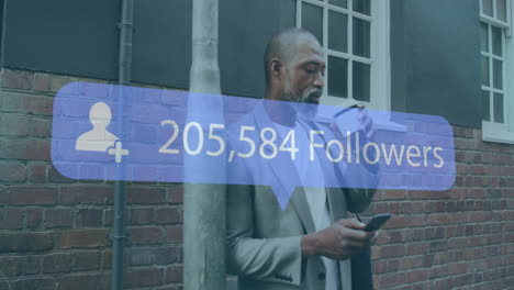 animation of numbers and followers text on banner over man having coffee and using smartphone
