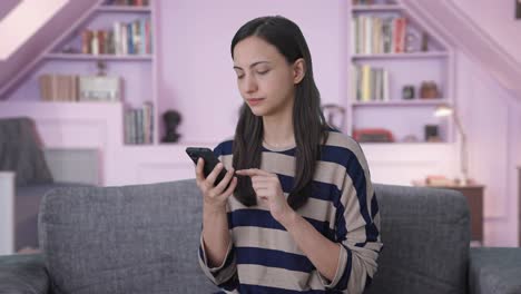 Indian-girl-using-mobile-phone