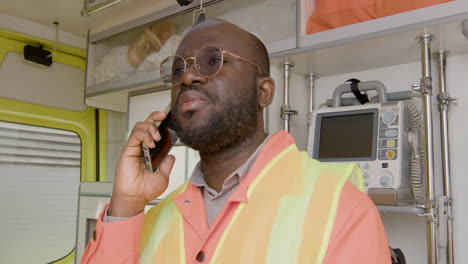 Close-Up-Of-American-Medical-Assistant-Talking-On-The-Phone