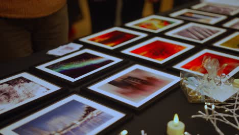 a row of colorful framed artistic abstract photos during exhibition closeup