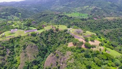 a beautiful sunny day in the green forest on the mountains of tikal ruins.
