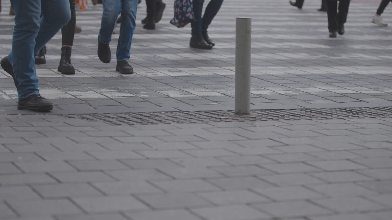People Crossing a City Street