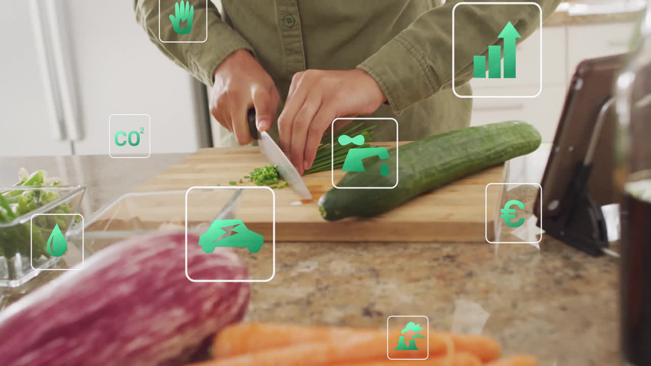 woman chopping green onions on countertop, displaying technology metrics with floating green icons